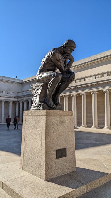 Photo of 'The Thinker' sculpture at Legion of Honor, San Francisco on a sunny day.